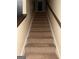 Carpeted stairs lead to the upper level of this home at 4752 Browns Mill Ferry, Lithonia, GA 30038