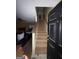 Carpeted stairway leading to upper level of home at 4752 Browns Mill Ferry, Lithonia, GA 30038