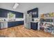 Kitchen features plenty of cabinets, sleek appliances and a sunny window at 74 Price W Dr, Locust Grove, GA 30248