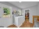 Bright laundry room with washer, dryer, and view to yard at 74 Price W Dr, Locust Grove, GA 30248