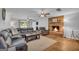 Cozy living room with a brick fireplace and comfortable seating area at 74 Price W Dr, Locust Grove, GA 30248