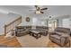 Open living room with stylish decor, wood floors, and ample natural light at 74 Price W Dr, Locust Grove, GA 30248