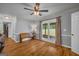 Bright living room with French doors leading to a garden at 74 Price W Dr, Locust Grove, GA 30248