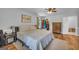 Bright main bedroom with closet and decorative touches at 74 Price W Dr, Locust Grove, GA 30248