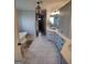 Elegant bathroom featuring marble floors, soaking tub, double sink vanity, and modern fixtures at 312 Archway Ln, Peachtree City, GA 30269