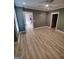 Bedroom featuring green walls, a ceiling fan, white trim, and wood look floors at 312 Archway Ln, Peachtree City, GA 30269