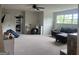 Versatile bonus room with carpet, large windows, and plenty of space for various activities at 312 Archway Ln, Peachtree City, GA 30269