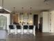 Kitchen with large island, bar stool seating, and stainless steel appliances at 312 Archway Ln, Peachtree City, GA 30269