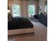 Modern bedroom featuring carpet, plentiful natural light, and a stylish dresser at 613 Elsa Lane # 77, Mcdonough, GA 30252