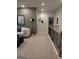 Upstairs hallway with carpet and light fixture at 613 Elsa Lane # 77, Mcdonough, GA 30252