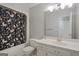 Well-maintained bathroom featuring classic fixtures, a shower-tub combination, and neutral colors at 885 Kelleytown Rd, Mcdonough, GA 30252
