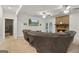 Spacious living room with comfortable seating and a stone fireplace creating a cozy atmosphere at 885 Kelleytown Rd, Mcdonough, GA 30252