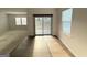 Bright living room with wood flooring, sliding glass doors, and natural light at 2051 Blue Sky Ave, Covington, GA 30016