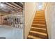 Unfinished basement with exposed ceiling, wooden studs, and potential for customization at 1010 Capella Creek Way, Grayson, GA 30017