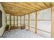 Charming screened patio with brick accents and a view of the surrounding yard at 1010 Capella Creek Way, Grayson, GA 30017