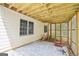 Covered patio with lattice and stone pavers offers a private outdoor retreat at 1010 Capella Creek Way, Grayson, GA 30017