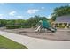 Neighborhood playground featuring swings, slides, and picnic tables at 1010 Capella Creek Way, Grayson, GA 30017