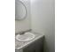Updated half-bathroom featuring a sleek vanity with granite countertop and modern faucet at 103 Tiburon Ct, Stonecrest, GA 30038