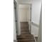 Hallway with stairs leading up to other rooms with doors on either side at 103 Tiburon Ct, Stonecrest, GA 30038