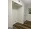 Convenient laundry room area with washer/dryer hookups, laminate flooring, and ample space at 103 Tiburon Ct, Stonecrest, GA 30038