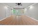 Spacious basement featuring double doors, a ceiling fan, and tile flooring at 1429 Kentmire Court, Locust Grove, GA 30248