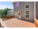 Wood deck featuring a door leading to the interior and outdoor space at 1429 Kentmire Court, Locust Grove, GA 30248