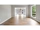 Inviting dining room with hardwood floors, wainscoting, and a chandelier at 1429 Kentmire Court, Locust Grove, GA 30248