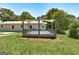 Inviting back deck attached to a single-story house with green backyard at 203 Brannan Rd, Mcdonough, GA 30253