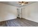 Bright bedroom with wood floors, a closet, and ample space providing a versatile and comfortable environment at 203 Brannan Rd, Mcdonough, GA 30253