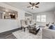 Inviting living room with contemporary decor, including a cozy sofa and stylish coffee table at 203 Brannan Rd, Mcdonough, GA 30253