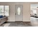 Inviting entryway showing a living room through the front door with privacy glass at 203 Brannan Rd, Mcdonough, GA 30253