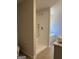 Bathroom featuring modern shower with tiled wall, soaking tub, and granite countertop vanity at 5314 Tolar Rd # 23, South Fulton, GA 30213