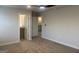 Bedroom with carpet flooring, walk-in closet, ceiling fan, and access to the bathroom at 5314 Tolar Rd # 23, South Fulton, GA 30213