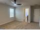 Bright bedroom with carpet flooring, ceiling fan, and a window providing natural light at 5314 Tolar Rd # 23, South Fulton, GA 30213