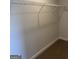Walk-in closet equipped with shelving for ample storage at 5314 Tolar Rd # 23, South Fulton, GA 30213