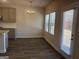 Cozy dining area with natural light, a modern chandelier, and easy access to the kitchen at 5314 Tolar Rd # 23, South Fulton, GA 30213