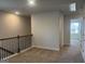 Second floor hallway with lots of natural light and neutral color palette at 5314 Tolar Rd # 23, South Fulton, GA 30213