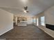 Open-concept kitchen and living area with stainless steel appliances and lots of natural light at 5314 Tolar Rd # 23, South Fulton, GA 30213