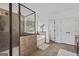 Spacious bathroom with tiled shower, soaking tub, and adjacent commode at 2265 Venture Dr, Marietta, GA 30062