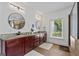 Bathroom featuring double vanity, granite counters, separate shower, and soaking tub at 2265 Venture Dr, Marietta, GA 30062