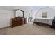 Bedroom featuring a large dresser with a mirror and a queen bed at 2265 Venture Dr, Marietta, GA 30062