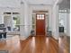 Bright foyer features wood floors, a front door with sidelights and transom window at 2265 Venture Dr, Marietta, GA 30062