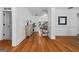 Bright foyer with hardwood floors, paneled walls, and open access to the rest of the home at 2265 Venture Dr, Marietta, GA 30062