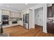 Bright kitchen with stainless steel appliances, double ovens, granite countertops, and hardwood floors at 2265 Venture Dr, Marietta, GA 30062