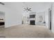 Bright living room with white fireplace, TV and natural light at 2265 Venture Dr, Marietta, GA 30062