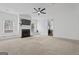 Spacious living room with a white fireplace, TV, and natural light at 2265 Venture Dr, Marietta, GA 30062