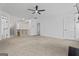 Open loft area with staircase, neutral carpet, and ample natural light at 2265 Venture Dr, Marietta, GA 30062