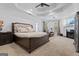 Spacious main bedroom with tray ceiling, fireplace, and luxurious furnishings at 2265 Venture Dr, Marietta, GA 30062