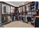 Organized walk-in closet featuring custom shelving and ample storage space at 2265 Venture Dr, Marietta, GA 30062