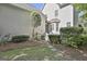 Inviting backyard featuring lush greenery, a stone pathway, and mature trees for privacy at 100 Concord Ct, Fayetteville, GA 30214